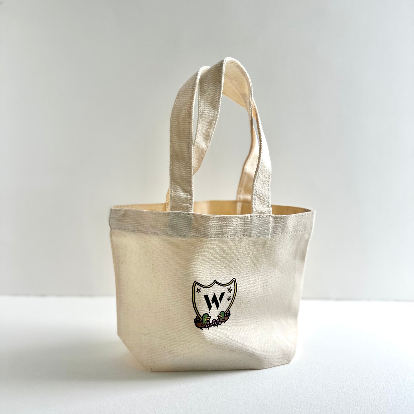 Twin ducks monogram crest bag