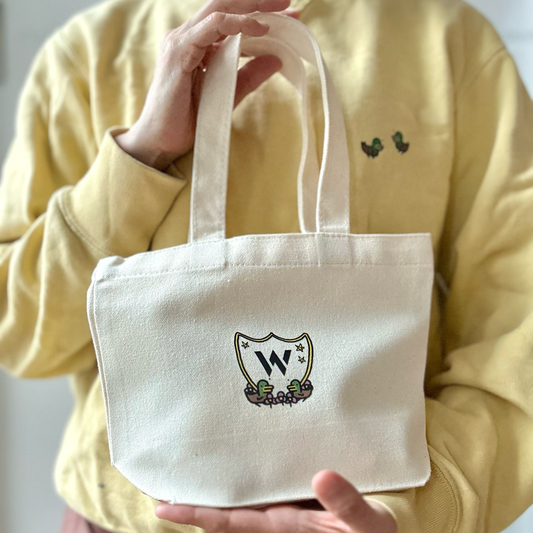 Twin ducks monogram crest bag