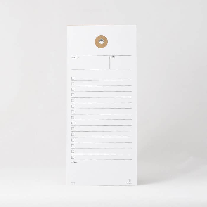 Tagged holed notepad