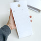 Tagged holed notepad