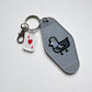 Pigeon Motel Keychain