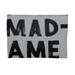 Block lettered Madame